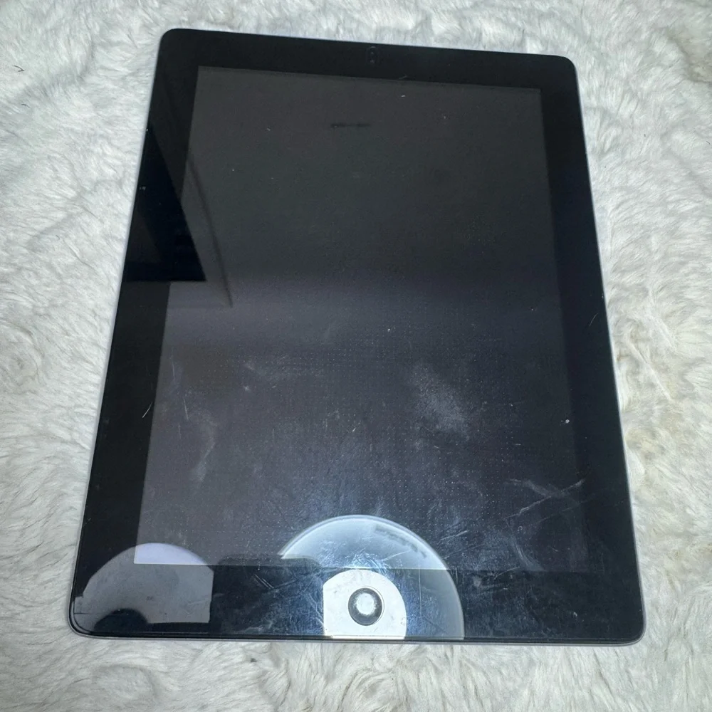 Apple iPad 4th Generation for parts or repairs (read)